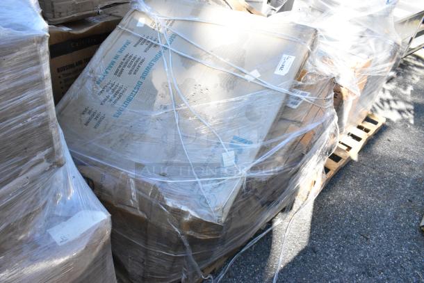 Five new boxes containing Regency 600B31014 bar sinks, wrapped on a pallet. Markings indicate product details and origin.
