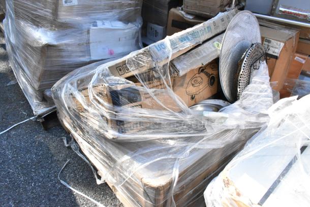 Five brand new boxed items, including a Regency 600B31014 bar sink, wrapped in plastic on a pallet.