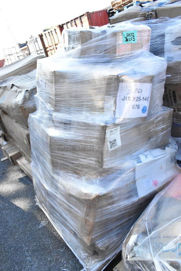Wrapped pallet of 20 new boxes containing a condiment organizer, batter beater, beverage dispenser, faucet, and wine glasses.