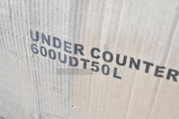 Alt text: Cardboard box marked "UNDER COUNTER 600UDT50L," part of 15 new boxes with dish table, wire shelf.