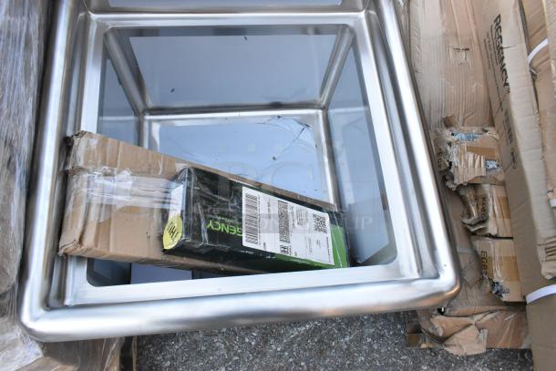 Brand new Steelton 522CS11818N stainless steel single bay sink. Scratch and dent condition, visible in original packaging.