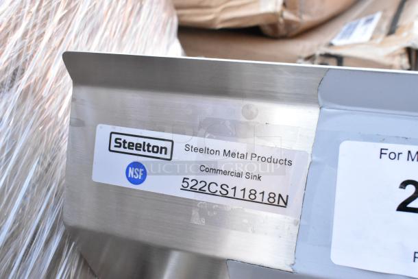 Steelton 522CS11818N Stainless Steel Single Bay Sink, new with scratches and dents, NSF certified label visible.