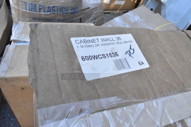 Box labeled "CABINET WALL 36" with sliding door dimensions, part number 600WCS1536, brand new and sealed packaging.