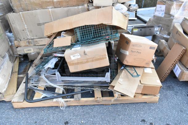 Pallet with 12 brand new boxes including wire shelves and Baker's Lane tart pans. Boxes are unopened and stacked.