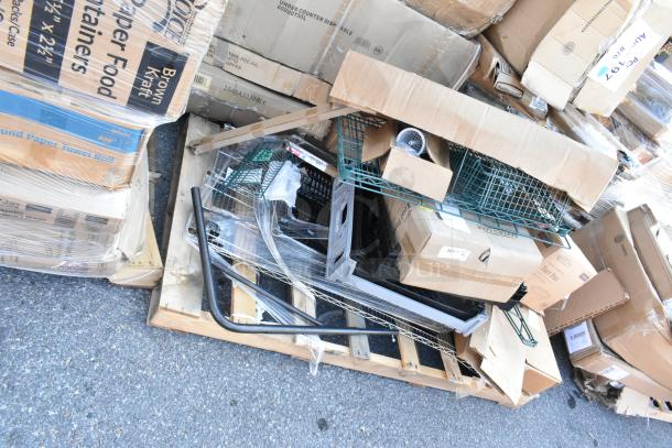 12 unopened boxes with wire shelves and tart pans on a pallet. Boxes have visible labels indicating new condition.