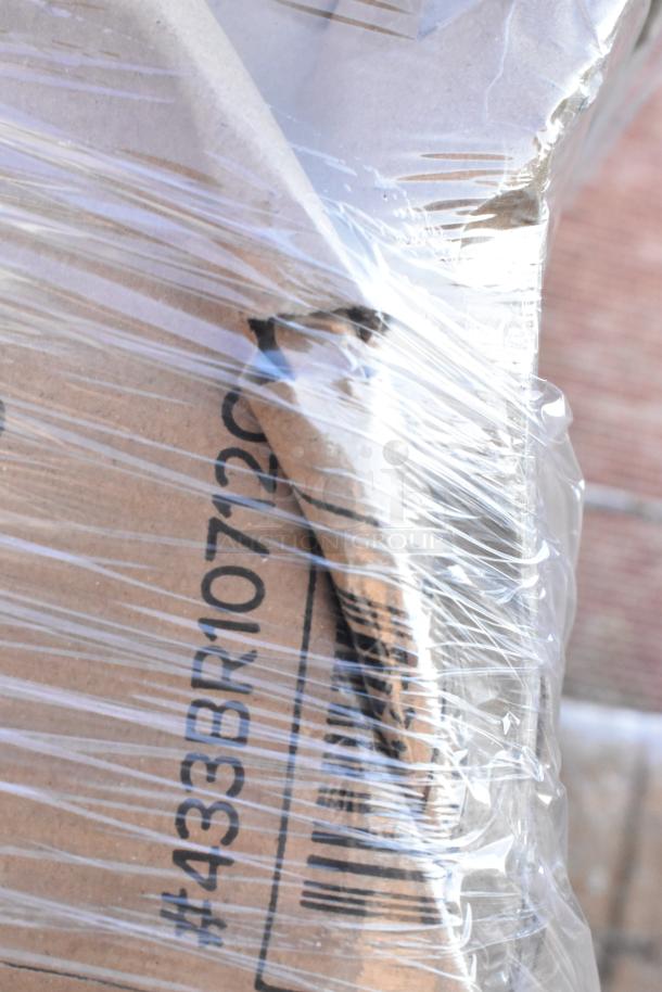 Stack of brand new boxed items wrapped in plastic. Visible label shows #433BR10729. Contains containers, bowls, tumblers.