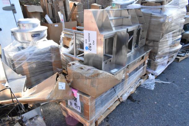 Three brand new 60" stainless steel cocktail stations with liquor display racks and cold plates, packed on pallets.