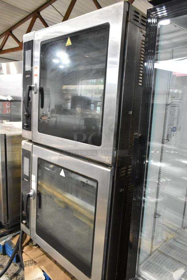 2 Alto Shaam AR-7T stainless steel rotisserie ovens, 7 spits, self-cleaning, electric, 208V, commercial-grade condition.