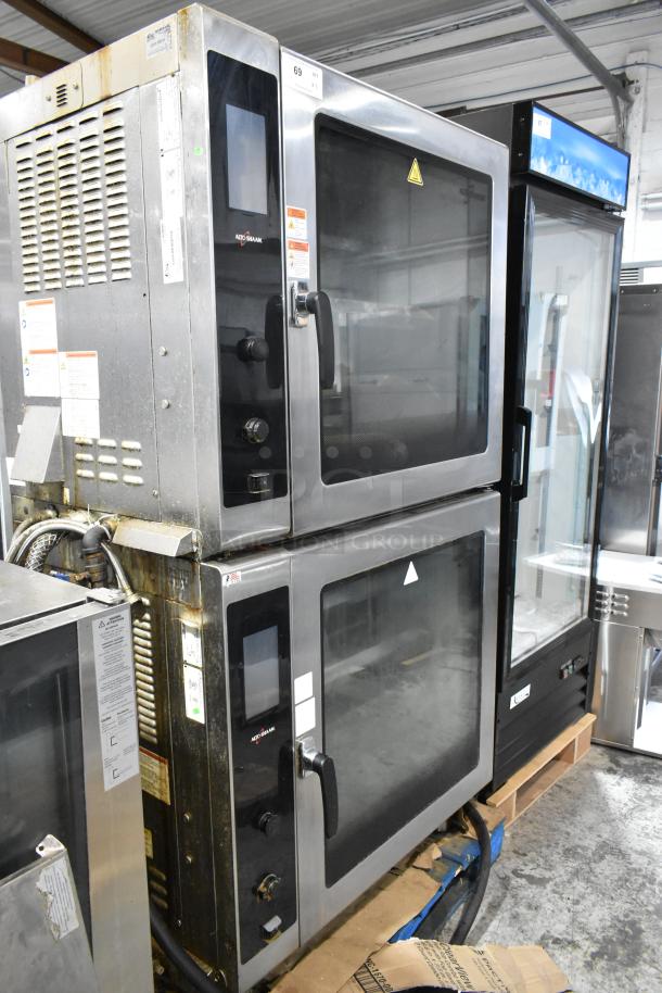 2 Alto Shaam AR-7T stainless steel commercial rotisserie ovens, 7 spits, self-cleaning, electric, 208V, 1 phase, visible controls.