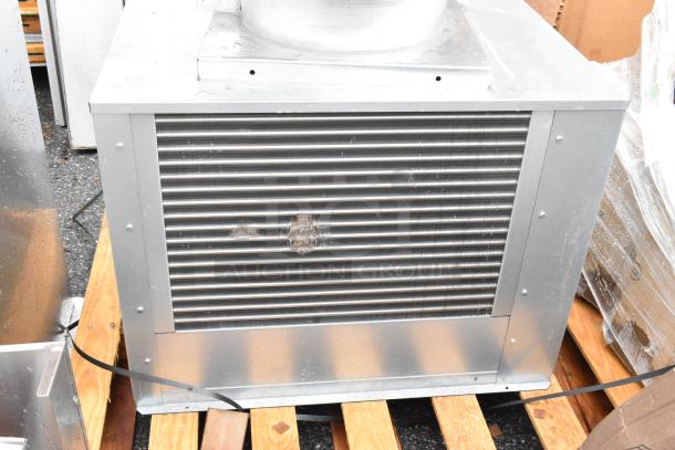 BRAND NEW SCRATCH AND DENT Manitowoc remote compressor for ice head; minor dents on grille; silver finish; unpackaged.