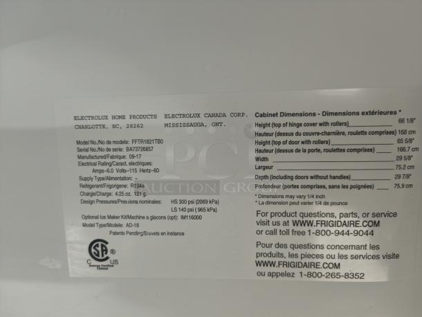 Frigidaire FFTR1821TB0 label with model, serial number, and dimensions. Includes manufacturing details and service information.