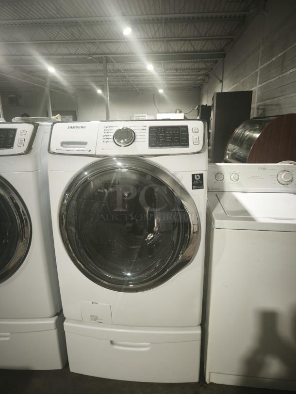Samsung 27" front load washer, model WF45H6300AW, white, 13 wash cycles, 1,300 RPM, Steam, Energy Star certified.