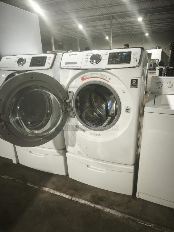 27" SAMSUNG front load washer, model WF45H6300AW, 13 cycles, 1,300 RPM, steam, white. Open door, digital display visible.