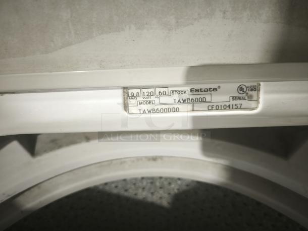 Estate top-load washing machine, model TAWB600D, shown with label indicating 120 volts, 9.8 amps, serial CF0104157.