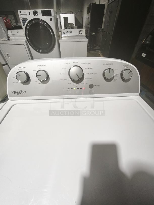 Whirlpool top load washer, model WTW5000DW, 4.3 cu.ft, 12 cycles, quick wash feature, control panel close-up.