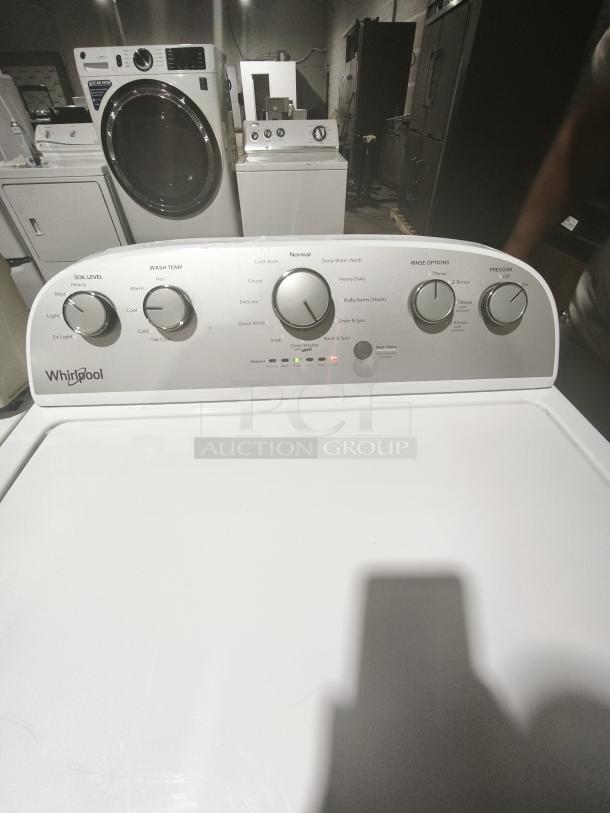 Whirlpool WTW5000DW 4.3 cu.ft top load washer, white, 12 cycles, Quick Wash feature. Control panel visible with dials.