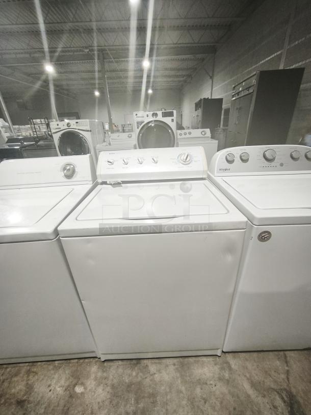 Kenmore 80 series top load washer, model 110.27721600, white, in good used condition, visible control knobs, no labels.