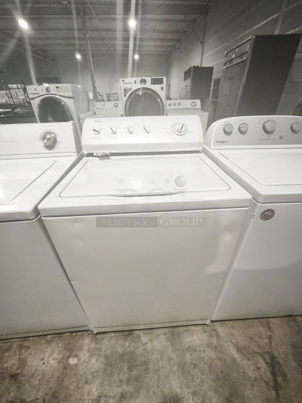Kenmore 80 Series top load washer, model 110.27721600, white, with control panel dials, in used condition.