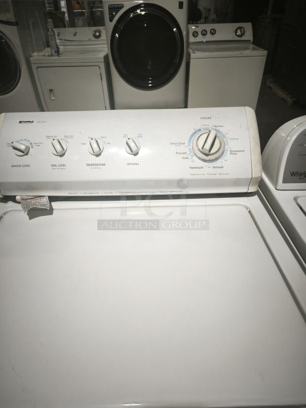 Kenmore 80 series top load washer, model 110.27721600, with control knobs for water level, soil level, temperature, and cycles.