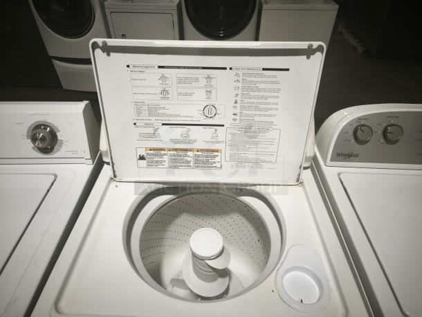 Kenmore 80 Series top load washer, model 110.27721600, white, with control panel and open lid revealing drum. Good condition.