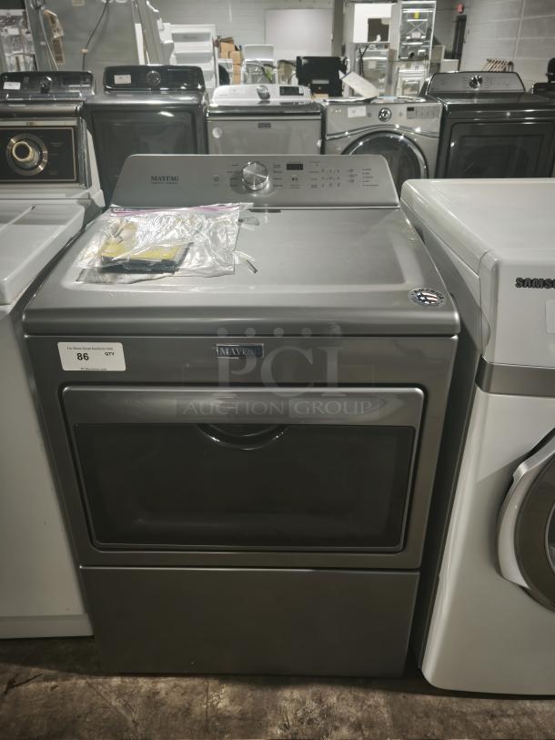 MAYTAG 27" electric dryer in metallic slate with IntelliDry® Sensor, 7.4 cu. ft. capacity, and Wrinkle Prevention option. Model MEDB765FC0.