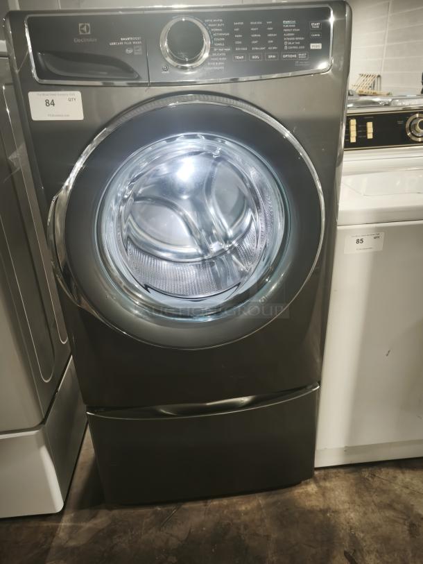 ELECTROLUX 27-inch front load washer, model ELFW7637BT0, featuring 4.5 cu. ft. capacity, various wash settings, and ENERGY STAR certified.
