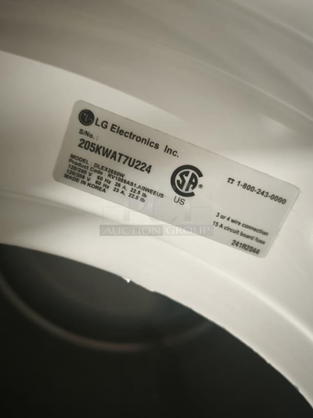 LG Electric Dryer Model DLEX2650W label, 7.3 cu. ft. capacity, steam functions, made in Korea, white.