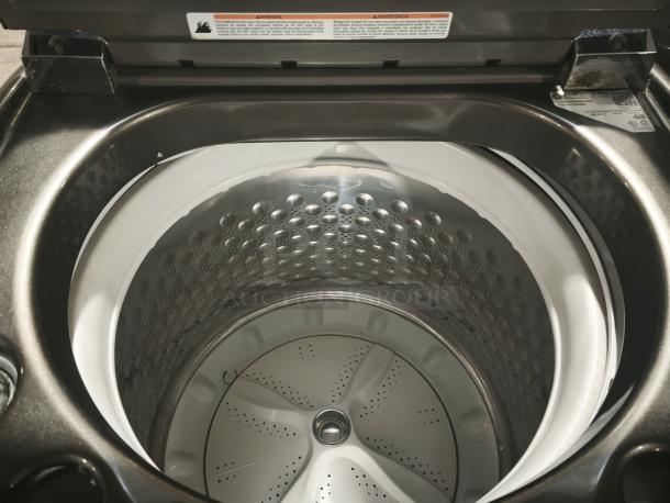 GE® 5.0 cu. ft. washer, model GTWS8655D0MC, stainless steel basket, steam feature, excellent condition.