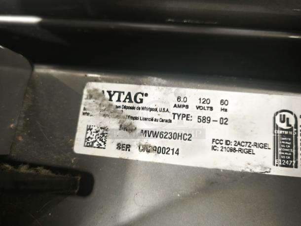 Label on Maytag 27" washer, model MVW6230HC2, shows specs: 6.0 Amps, 120 Volts, UL certified. Some wear visible.