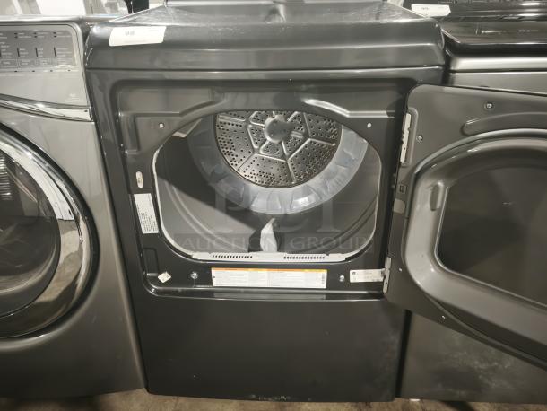 GE Profile Smart Electric Dryer, Model PTD60EBPRDG, 7.4 Cu. Ft., Diamond Gray, open door view, features sanitize cycle and sensor dry.