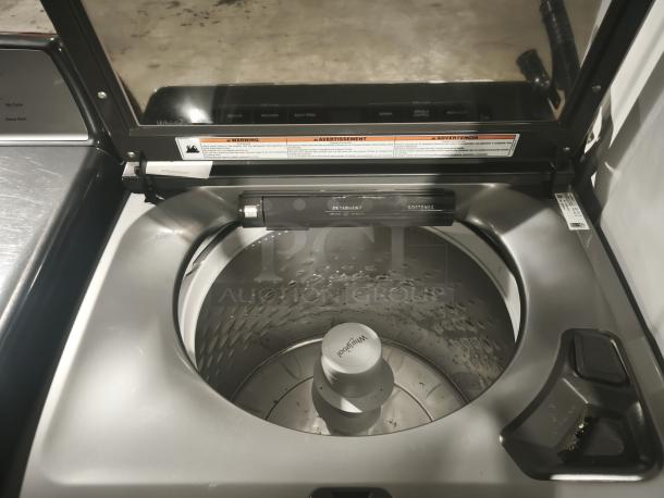 Whirlpool 4.7 Cu. Ft. Top Load Washer, model WTW5105HC2, in Chrome Shadow, featuring Pretreat Station, visible control panel.