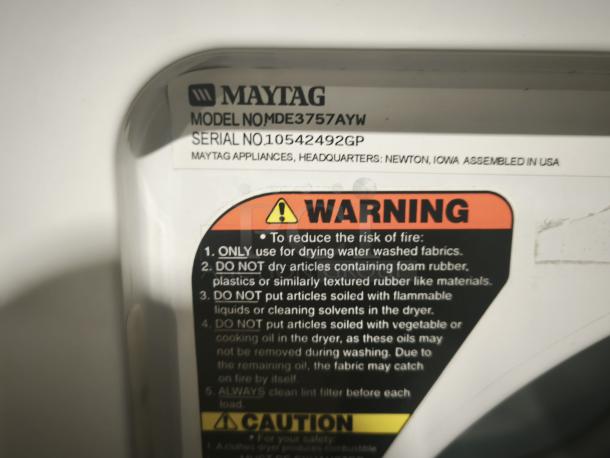 Maytag MDE3757AYW electric dryer label showing model, serial number 10542492GP, and safety warnings.