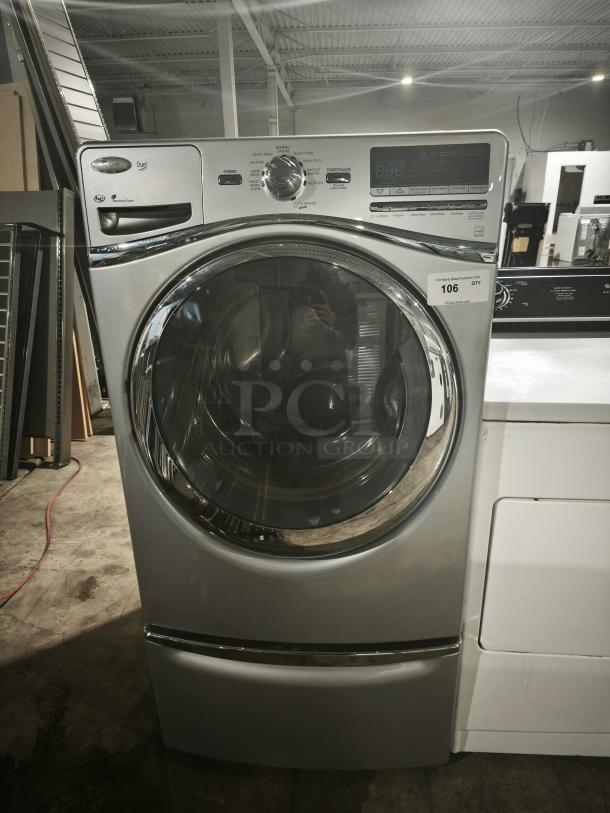 Whirlpool WFW94HEXL2 front-load washer, silver, large door, digital display, control knob, model tag shows 106 QTY, good condition.
