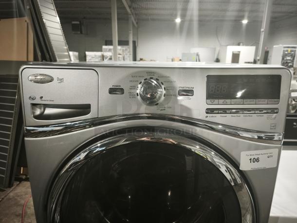 Whirlpool WFW94HEXL2 front-load washer, stainless steel, digital control panel, visible "Duet" and "Resource Saver" labels, good condition.