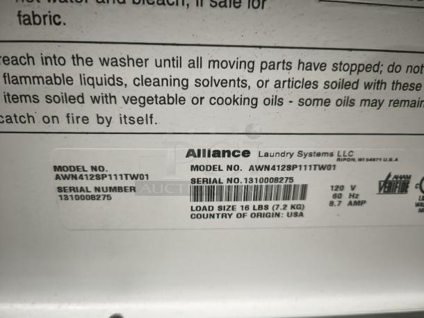 Speed Queen AWN412SP111TW01 top-load washer label showing model, serial number, capacity, and origin details.