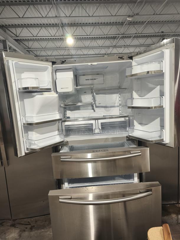 Samsung RF4287HA 4-door French door smart refrigerator, 28 cu. ft., fingerprint-resistant stainless steel, open view, excellent condition.