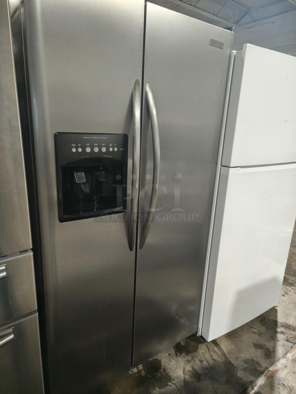 Frigidaire Gallery 22.6 Cu. Ft. side-by-side refrigerator, model PHSC39EESS, in stainless steel with external water/ice dispenser.