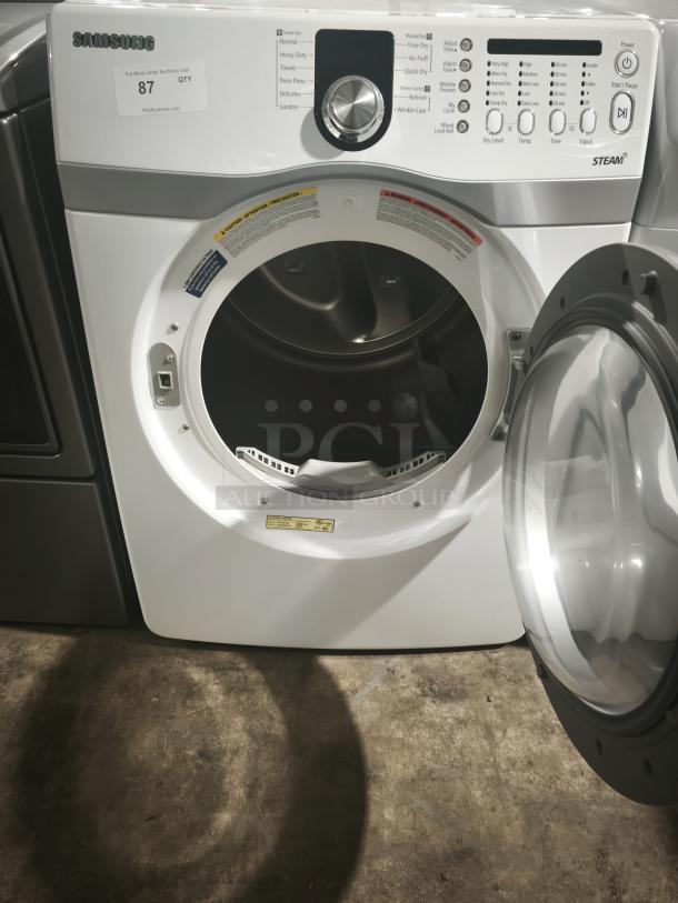 Samsung DV407AEW/XAA 7.3 Cu. Ft. Front Load Electric Dryer, white, features various drying modes, labelled controls, open door.