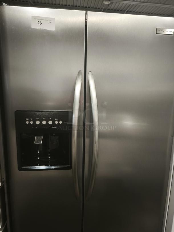 Frigidaire Gallery 22.6 Cu. Ft. Side-by-Side Refrigerator, Model PHSC39EESS, stainless steel finish, ice/water dispenser, excellent condition.