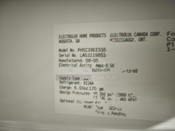 Frigidaire Gallery PHSC39EESS side-by-side refrigerator label showing model, manufacture date, and specifications.