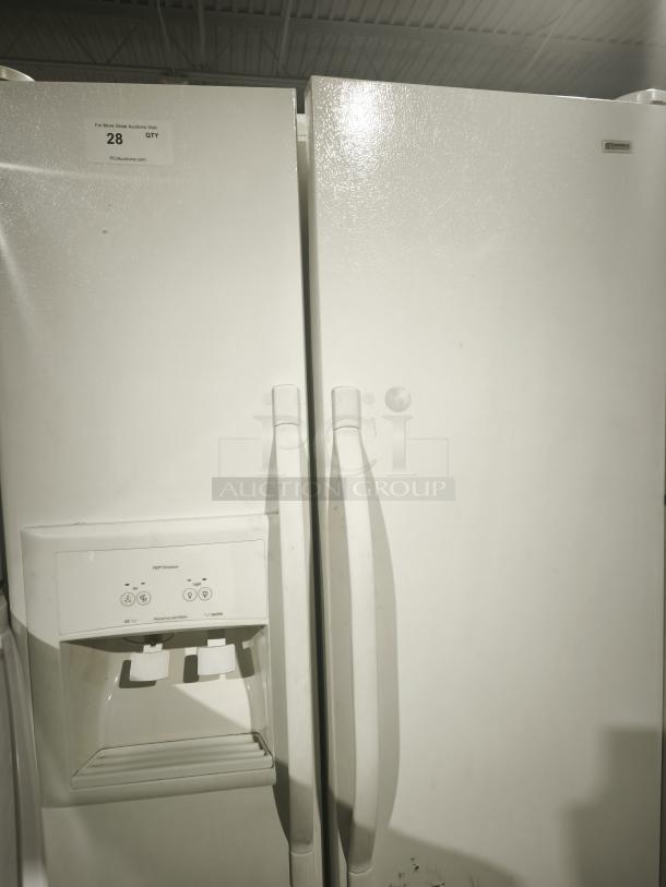Kenmore refrigerator model 10657362700, side-by-side, external water and ice dispenser, visible minor scuffs, auction tag on top.