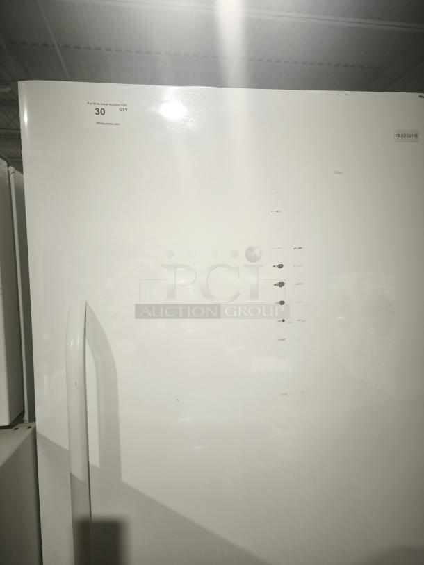 Frigidaire freezer model FFFH20F2QWF with mechanical dial control, automatic defrost, 4 wire shelves, Energy Star.