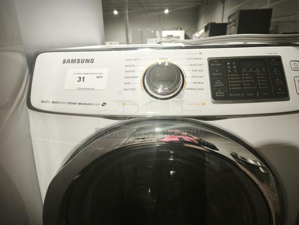 SAMSUNG Electric Dryer DV45H6300EW/A3 with 13 cycles, steam, Eco Dry, and sensor. White. Label indicates auction details.
