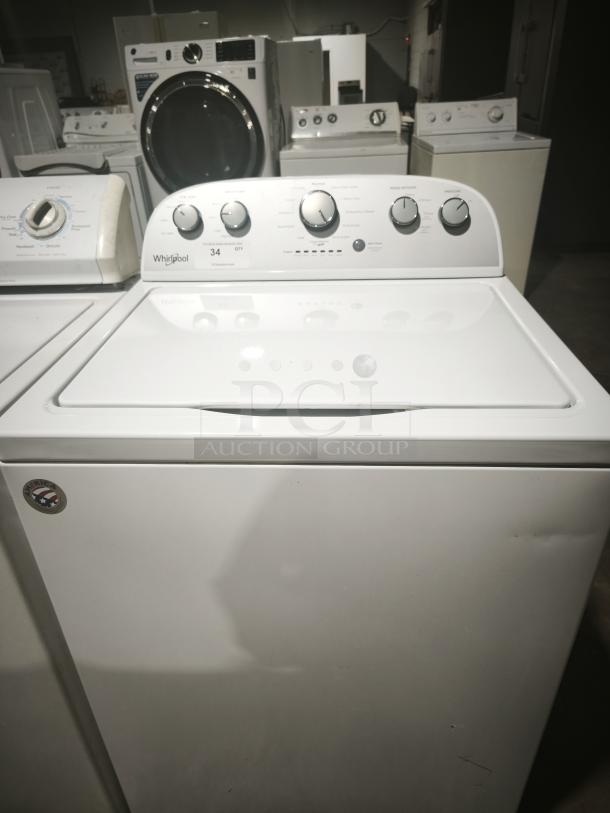 Whirlpool top load washer, model WTW5000DW2, 4.3 cu.ft, 12 cycles, Quick Wash feature, in good condition.