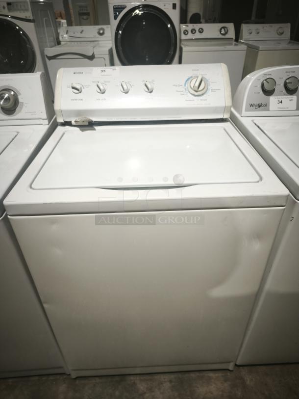 Kenmore 80 series top load washer, Model 110.27721600, features control knobs, white finish, visible wear on panel.