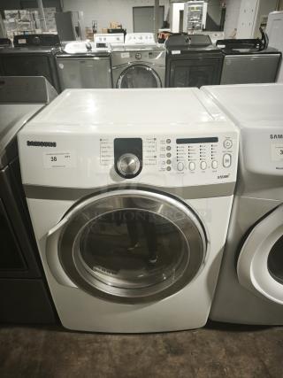 Samsung DV407AEW/XAA 7.3 cu. ft. front load electric dryer, white, good condition, visible control panel and steam feature.