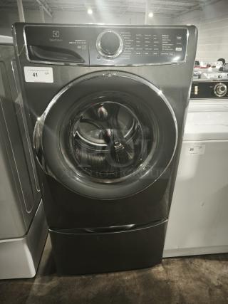 Electrolux 27" front load washer, 4.5 cu.ft. capacity, model ELFW7637BT0, features 11 wash programs, ENERGY STAR certified.