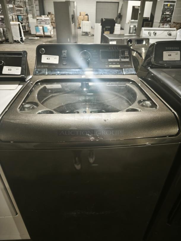 GE® GTWS8655D0MC washer, 5.0 cu. ft., stainless steel basket, steam feature, visible controls, lightly used condition.