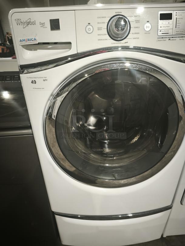 Whirlpool WFW94HEAW front-load washer, white, features multiple wash cycles, digital controls, and direct drive system.