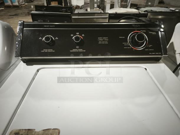 Whirlpool LA5580XTW1 washer, heavy-duty model, energy-saving selectors, and temperature controls, in good condition.